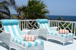 Relax on these comfortable lounge chairs by the pool